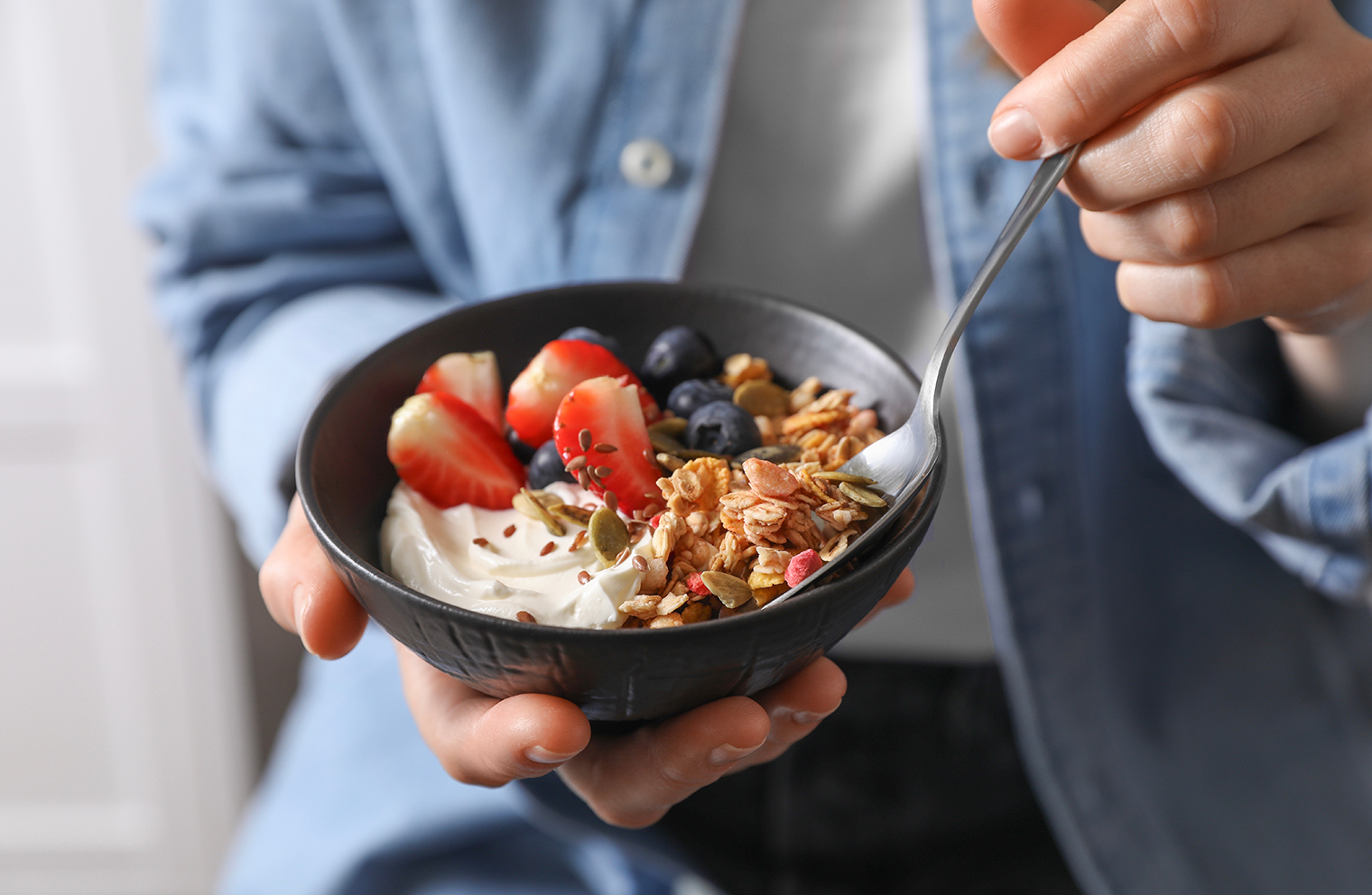 A bowl of healthy fruit and grains