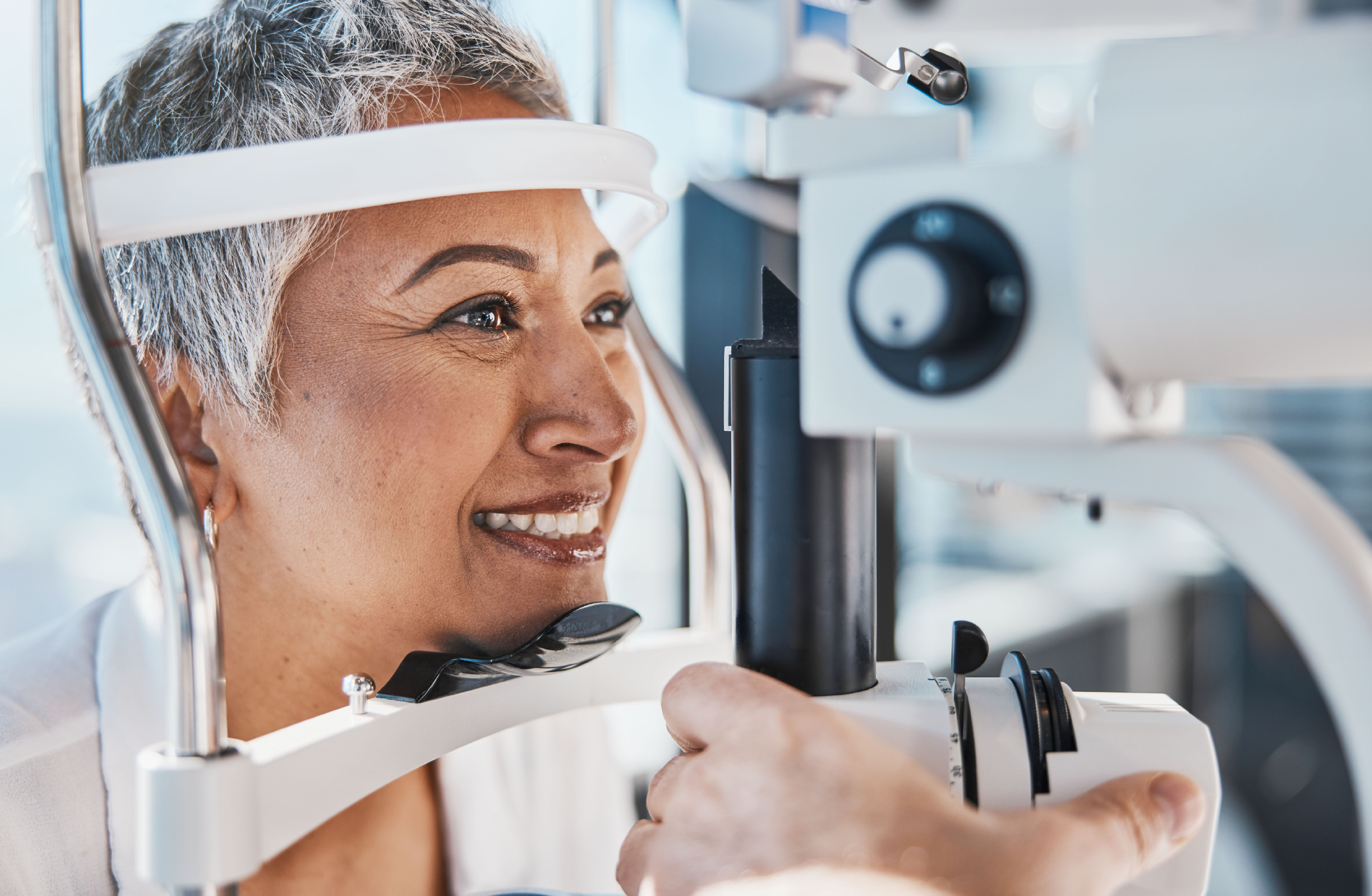 A woman gets an eye exam. 