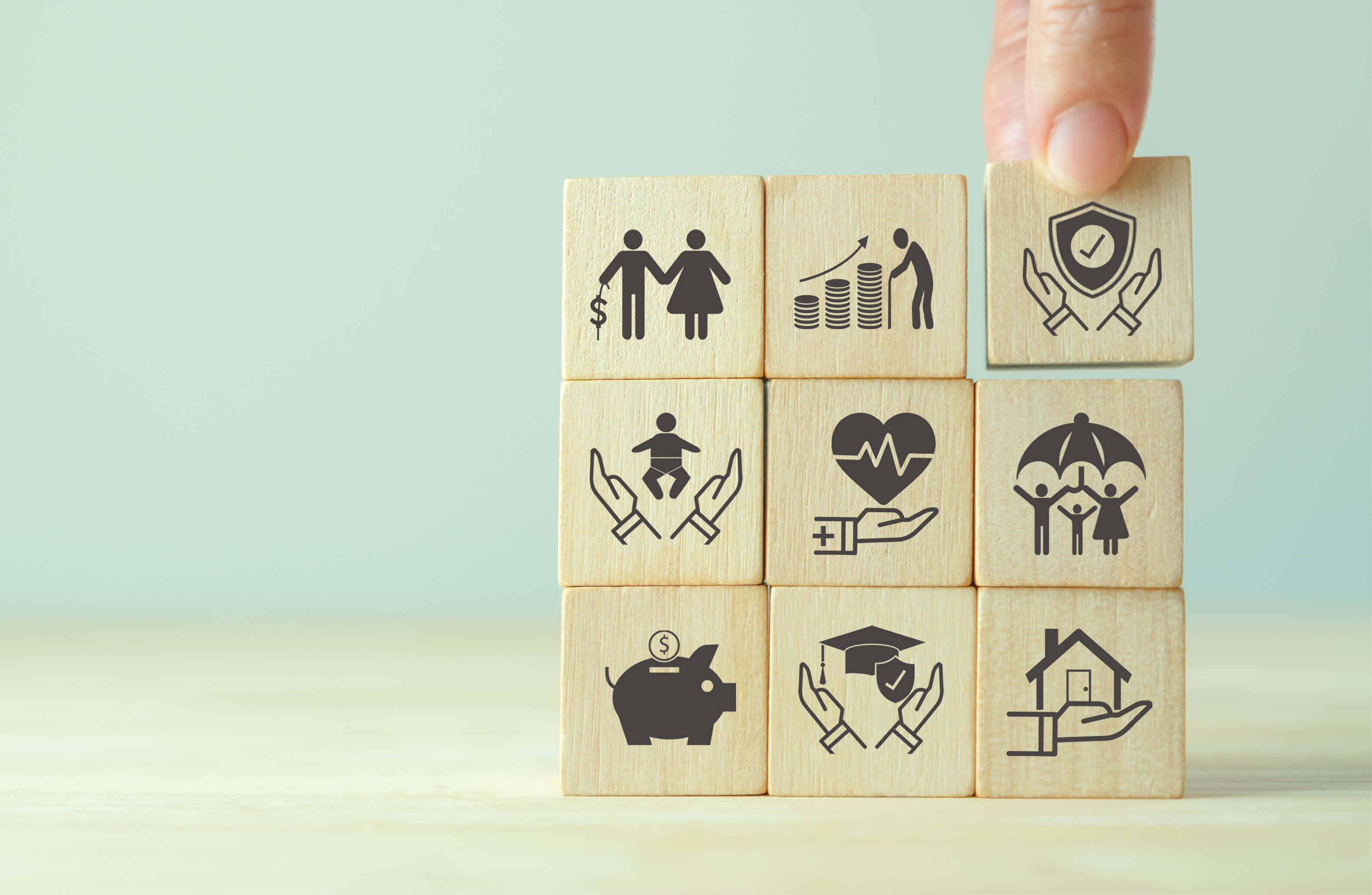 Picture of stacked wooden blocks with wellness icons