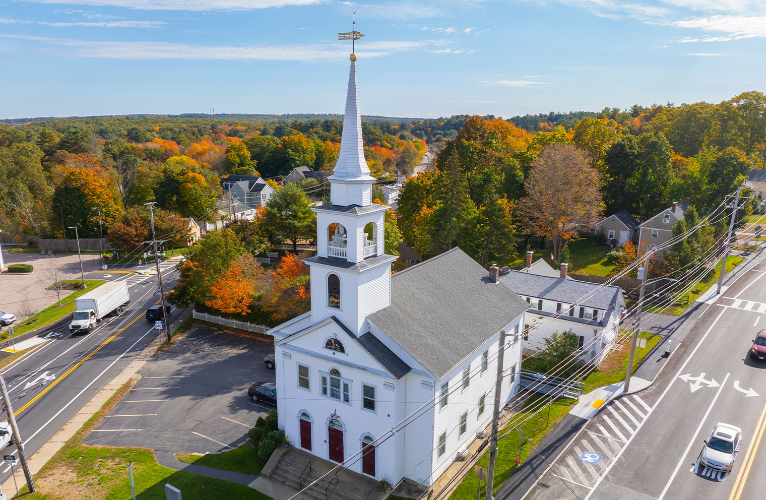 The exterior of a small church that has property and casualty insurance.